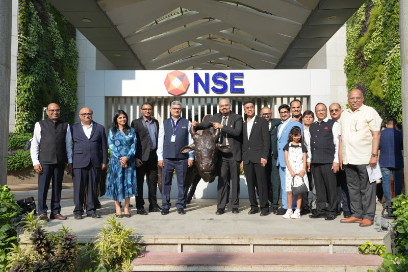 Official listing ceremony at the National Stock Exchange with team members celebrating the milestone.