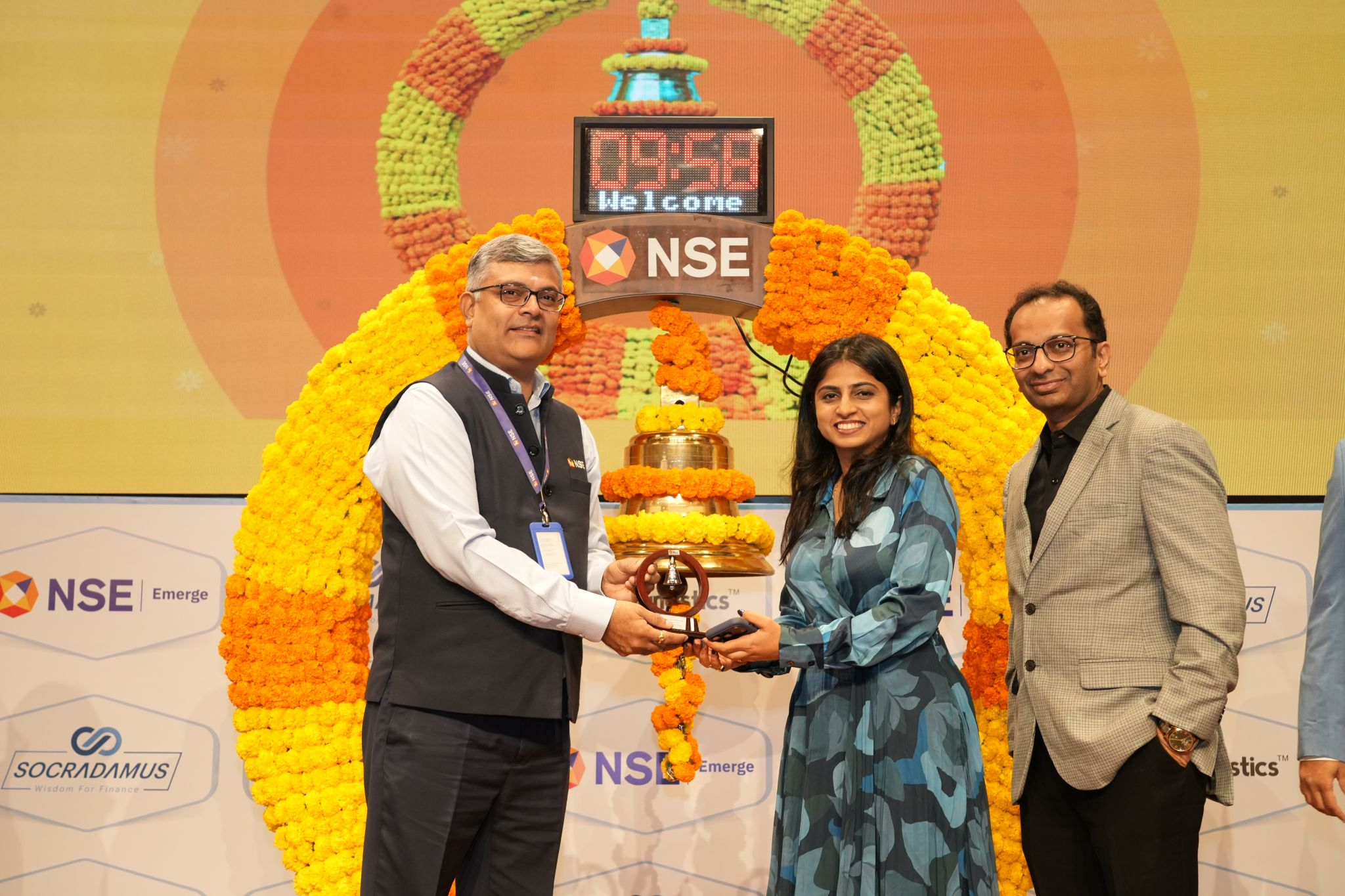 Socradamus team celebrating Diwali in the office with traditional decorations and festive attire.